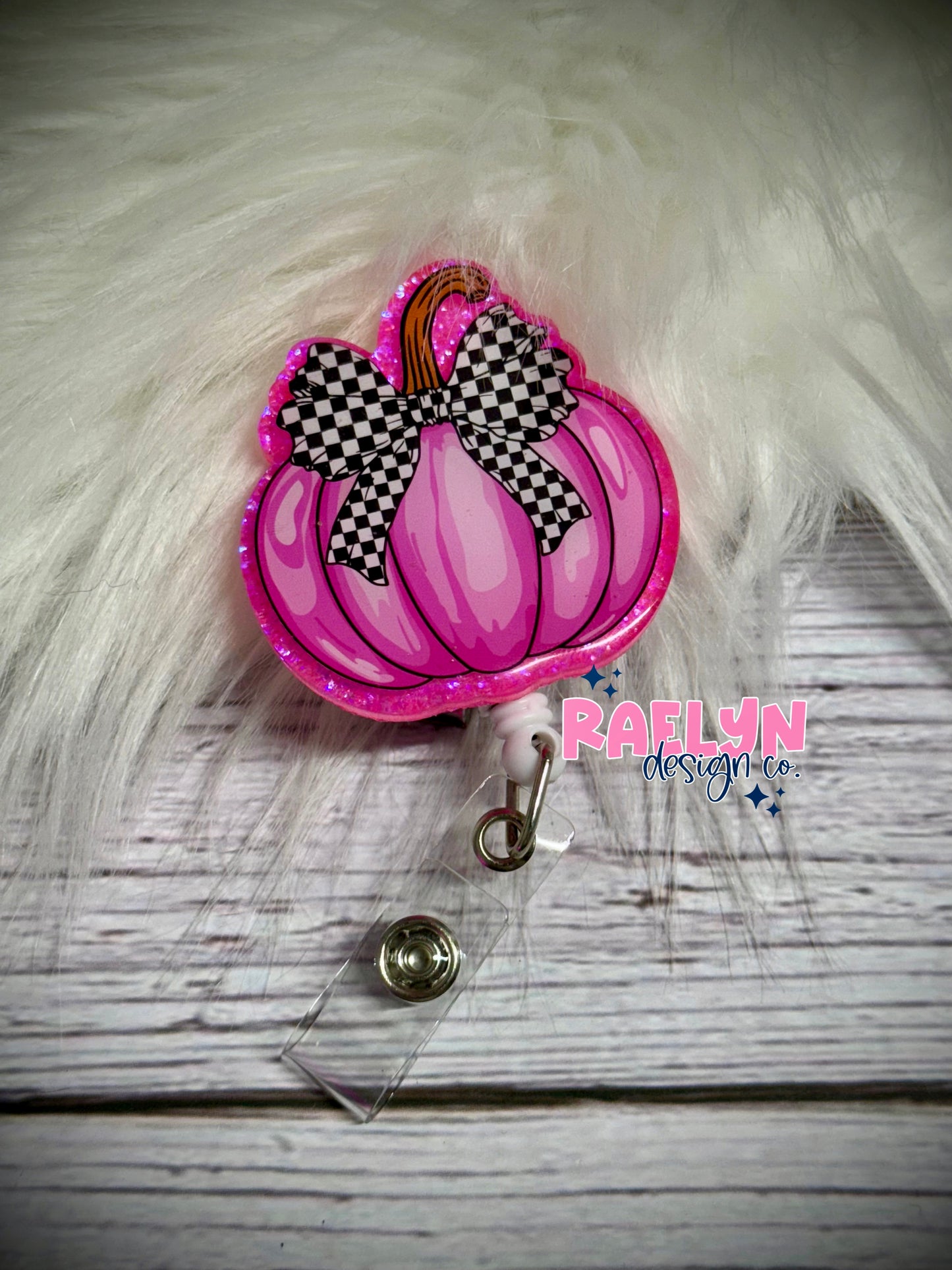 PINK PUMPKIN BADGE REEL