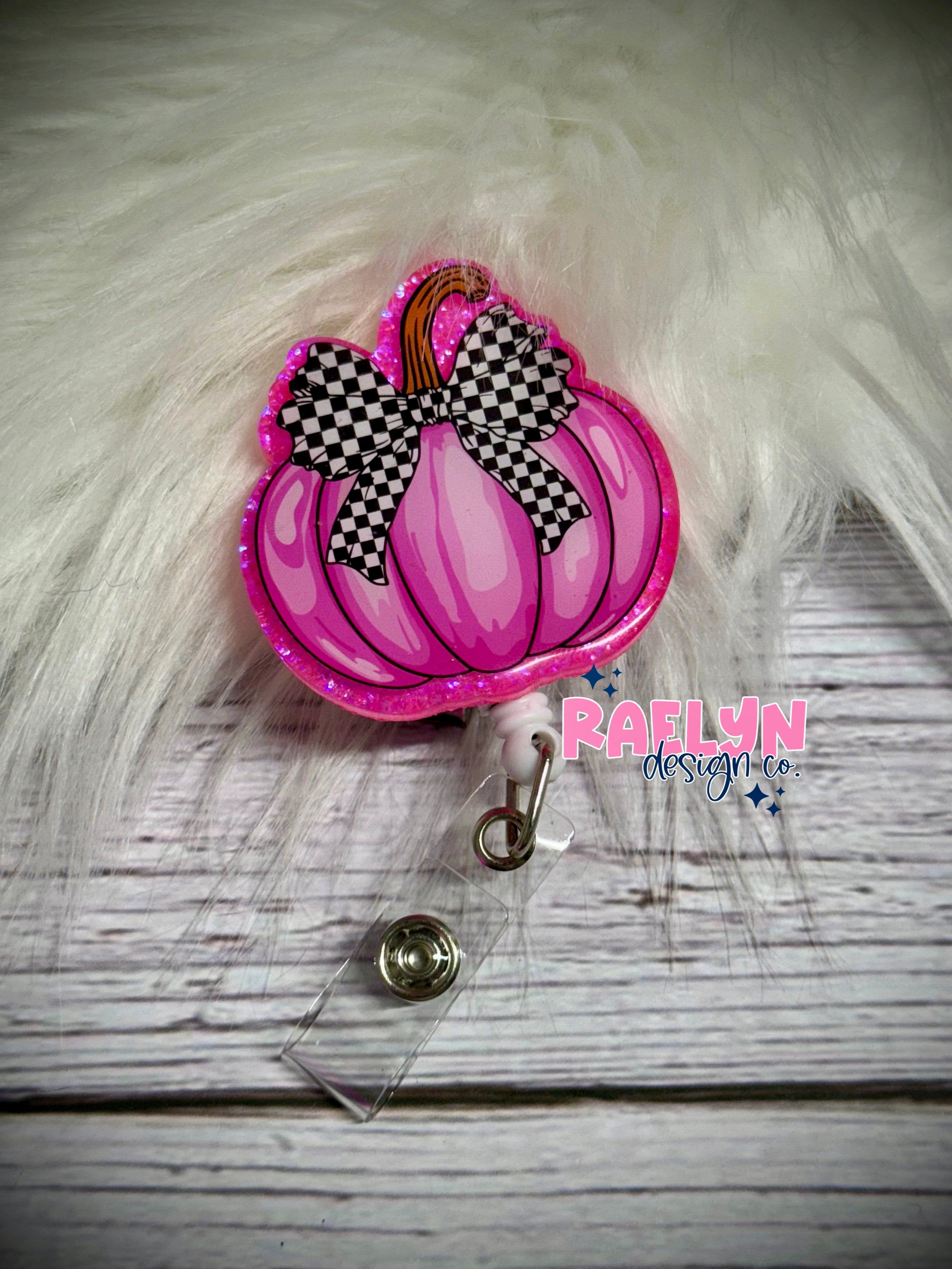 PINK PUMPKIN BADGE REEL